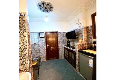 Kitchen or kitchenette, Living room, stove