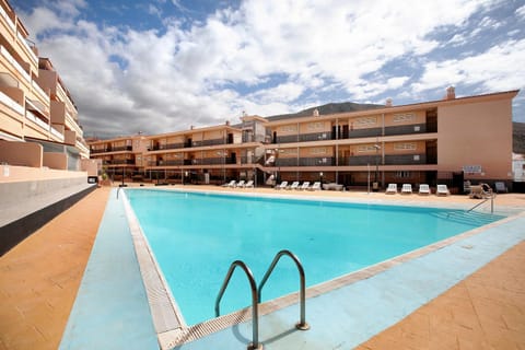 Property building, Living room, Swimming pool