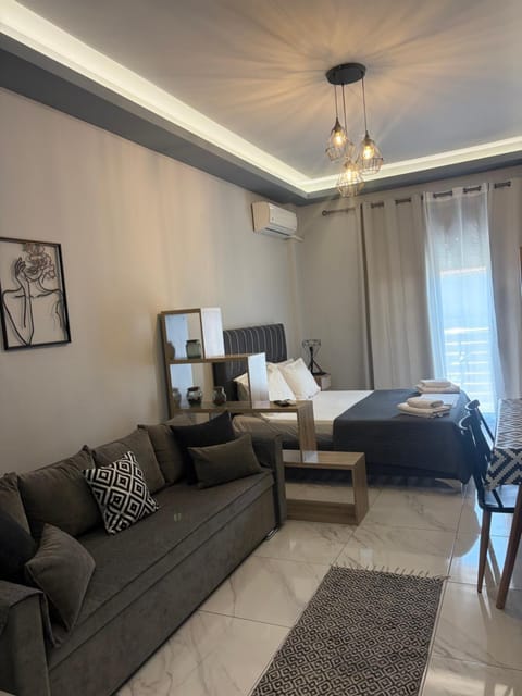 Bed, TV and multimedia, Living room, Photo of the whole room, Seating area, Bedroom, air conditioner, air conditioner