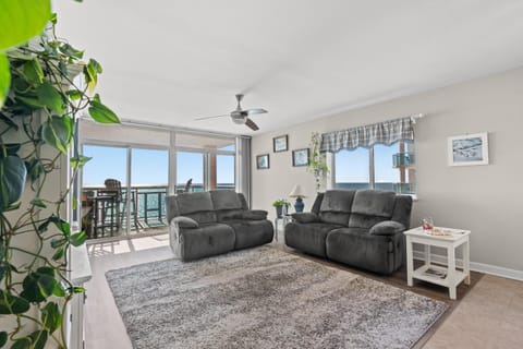 Natural landscape, View (from property/room), Balcony/Terrace, Living room, Seating area, Sea view, fireplace