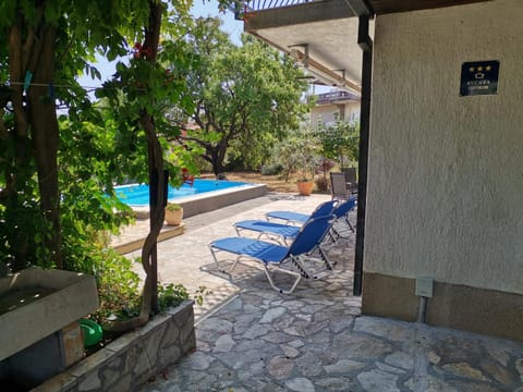 Patio, Day, Garden, Garden view, Pool view, Swimming pool, sunbed