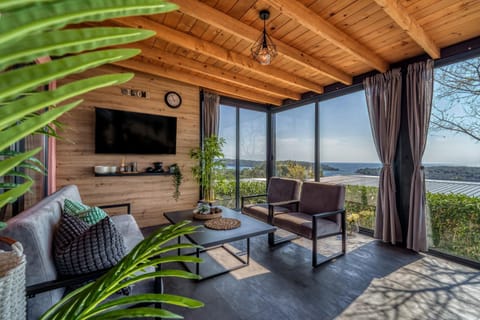 TV and multimedia, Balcony/Terrace, Seating area, Sea view, air conditioner