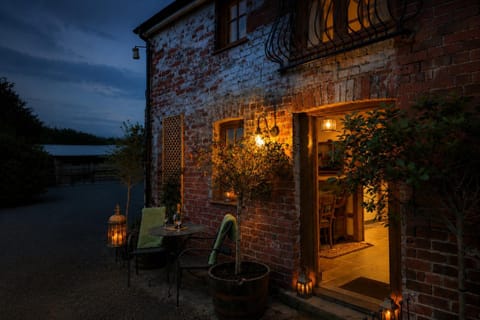 Property building, Patio, Night, Garden, Balcony/Terrace