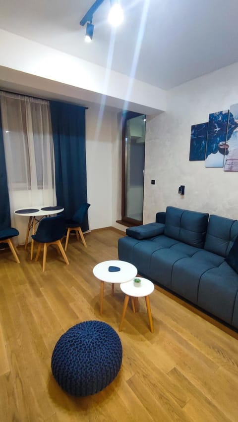 Bed, Living room, Seating area, Dining area