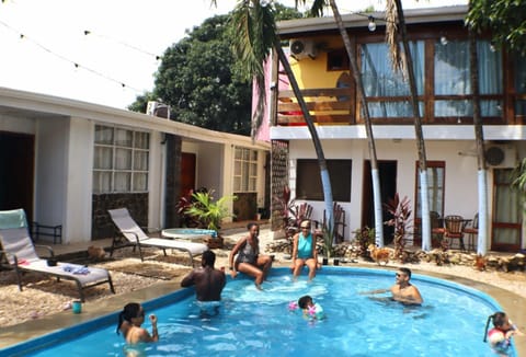 Property building, Patio, Day, People, Natural landscape, Pool view, Swimming pool, children, group of guests, sunbed