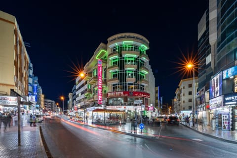 Property building, Night, People, Neighbourhood, City view, Street view, Location