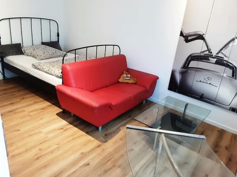 Bed, Living room, Seating area, Bedroom