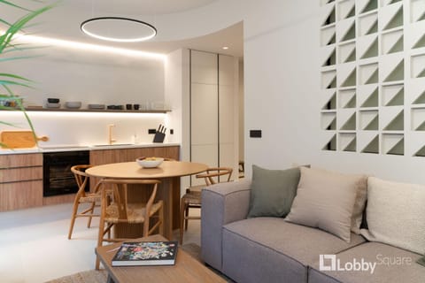 Kitchen or kitchenette, Living room, Seating area, Dining area