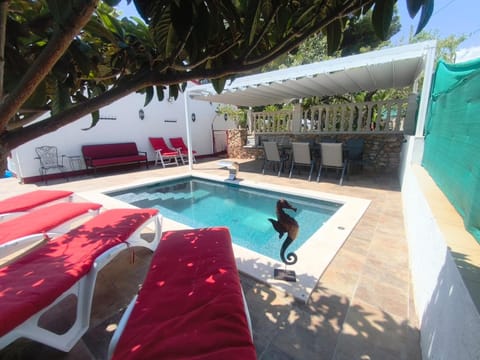 Patio, Natural landscape, Solarium, Dining area, Pool view, Swimming pool, sunbed