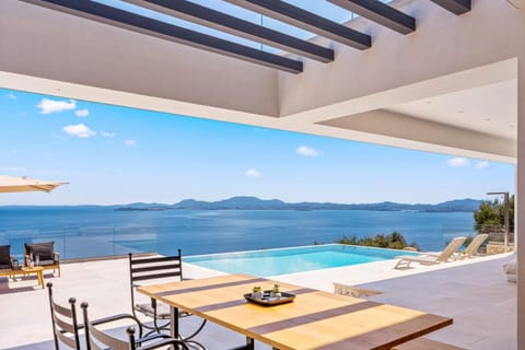 View (from property/room), Pool view, Sea view, Swimming pool