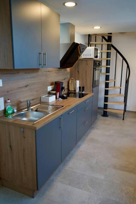 Kitchen or kitchenette, stove