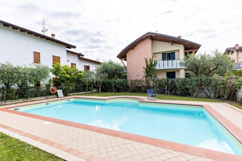 Property building, Living room, Swimming pool