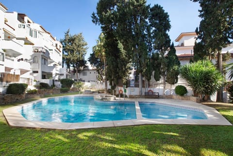 Property building, Living room, Swimming pool