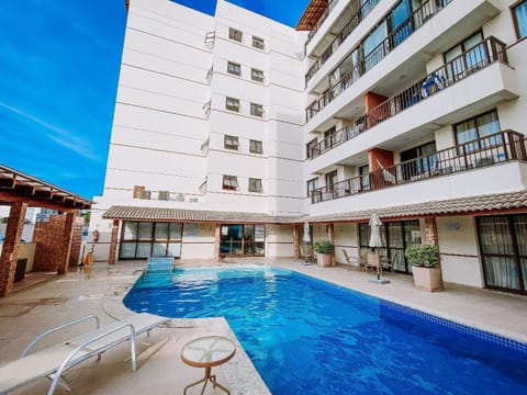 Property building, Pool view, Swimming pool, sunbed
