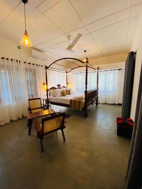 Bed, Photo of the whole room, Seating area, Bedroom, fireplace, air conditioner