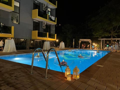 Property building, Night, Pool view, Swimming pool