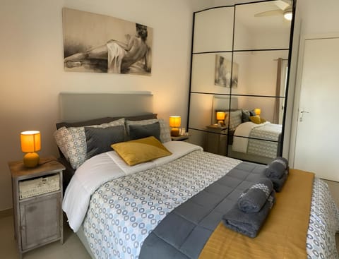 Bed, Bedroom, hair dresser, towels, wardrobe