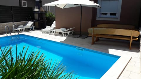 Property building, Patio, Swimming pool