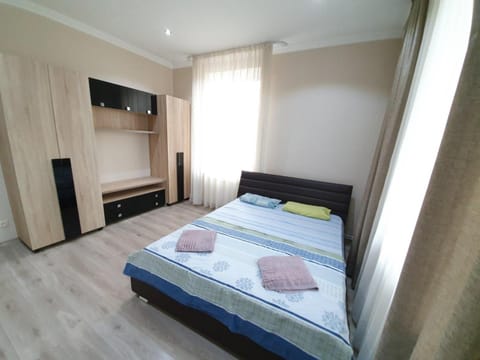 Bed, Photo of the whole room, Bedroom, towels, wardrobe