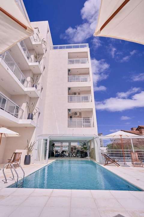 Property building, Patio, View (from property/room), Balcony/Terrace, Pool view, Swimming pool, sunbed