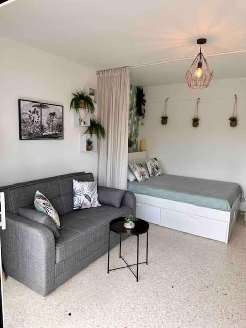 Bed, Living room, Seating area