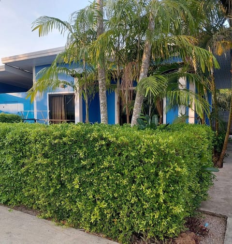 Property building, Patio, Text overlay, Garden view