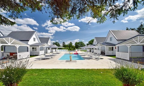 Property building, Pool view, Swimming pool, sunbed