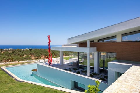 Property building, Natural landscape, Pool view, Sea view, Swimming pool, sunbed