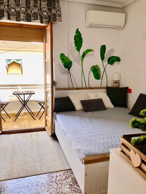 Bed, Balcony/Terrace, Bedroom, air conditioner