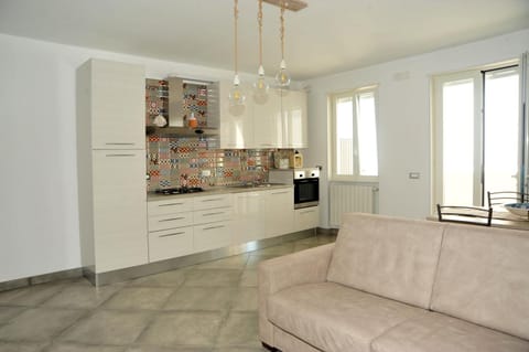 Kitchen or kitchenette, Living room, stove