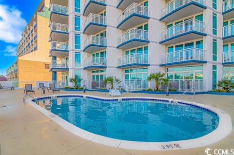 Property building, Pool view, Swimming pool, sunbed