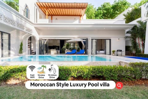 Patio, Day, Property logo or sign, Logo/Certificate/Sign, Text overlay, Pool view, Swimming pool, Certificate/Award, sunbed
