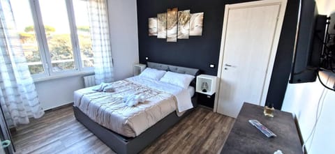 Bed, Photo of the whole room, Bedroom, towels, wardrobe