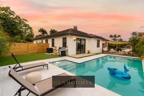 Property building, BBQ facilities, Swimming pool, Sunset, furniture, sunbed