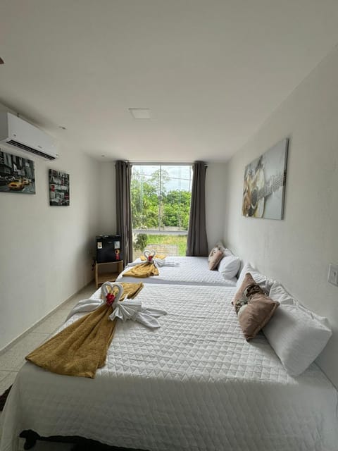 Bed, Photo of the whole room, Bedroom, towels, air conditioner