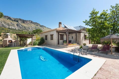 Property building, Living room, Swimming pool