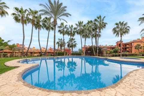Property building, Living room, Swimming pool