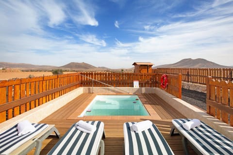 Property building, Living room, Swimming pool