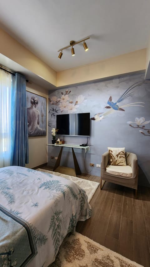 Bed, Living room, Seating area, Bedroom