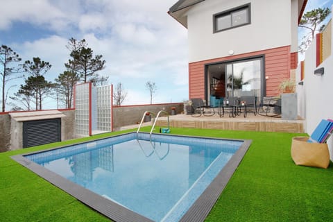 Property building, Living room, Swimming pool