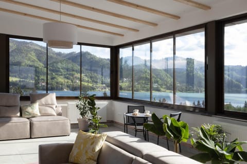 Communal lounge/ TV room, Bird's eye view, Balcony/Terrace, Living room, Seating area, Garden view, Lake view, Mountain view