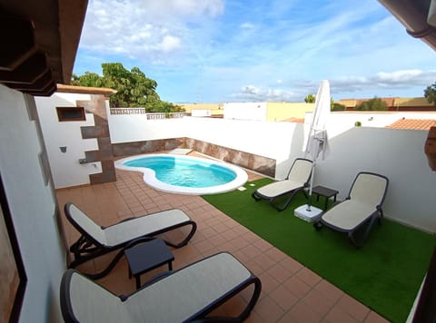 Patio, Day, Pool view, Swimming pool, sunbed