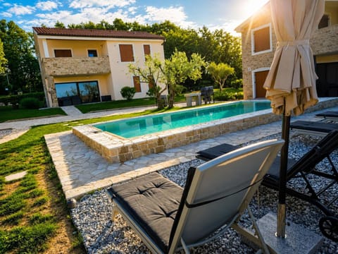 Property building, Natural landscape, Garden, Seating area, Garden view, Pool view, Swimming pool, sunbed