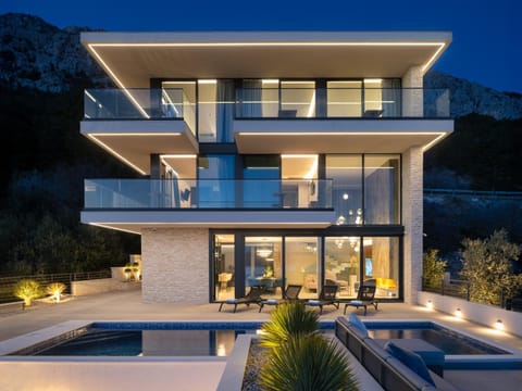 Property building, Night, Balcony/Terrace, Seating area, Pool view, Swimming pool