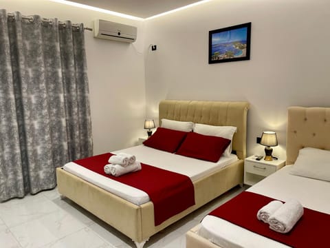 Bed, Photo of the whole room, Bedroom, towels, air conditioner