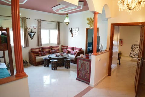 Property building, Living room, Seating area, Dining area