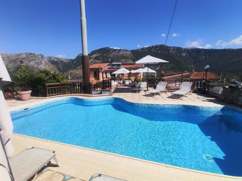 Property building, Nearby landmark, Restaurant/places to eat, Spring, Day, Natural landscape, Winter, Summer, BBQ facilities, Garden, View (from property/room), Balcony/Terrace, Autumn, Mountain view, Pool view, Swimming pool, Seasons, group of guests, Family, sunbed