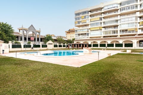 Property building, Living room, Swimming pool
