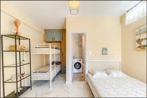 Bed, Bedroom, bunk bed, towels, washing machine, dryer