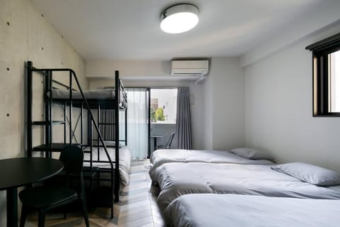 Bed, Living room, Photo of the whole room, Bedroom, bunk bed, air conditioner